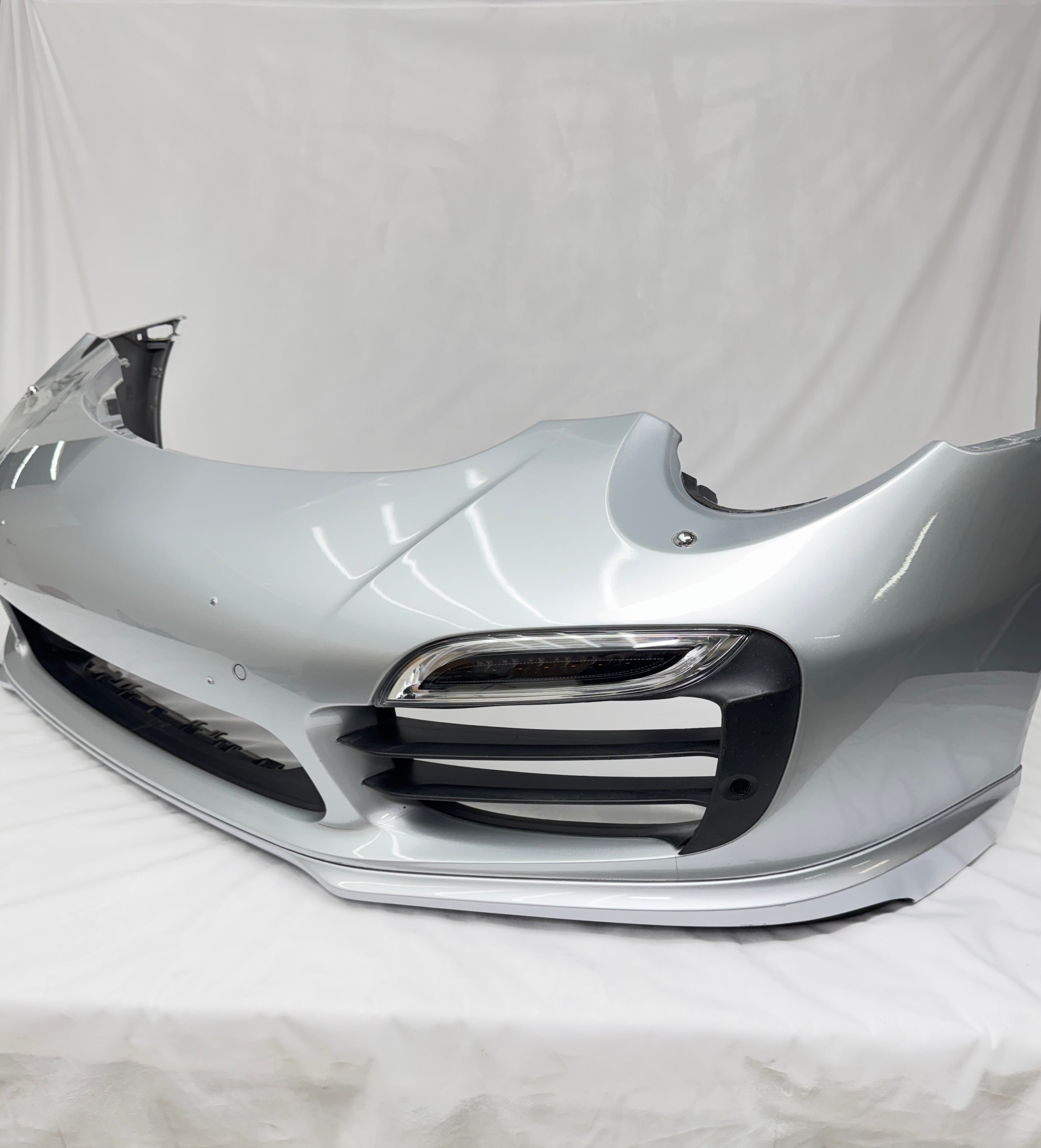 Porsche Factory OEM 991 Turbo front bumper with lights & grills in silver
