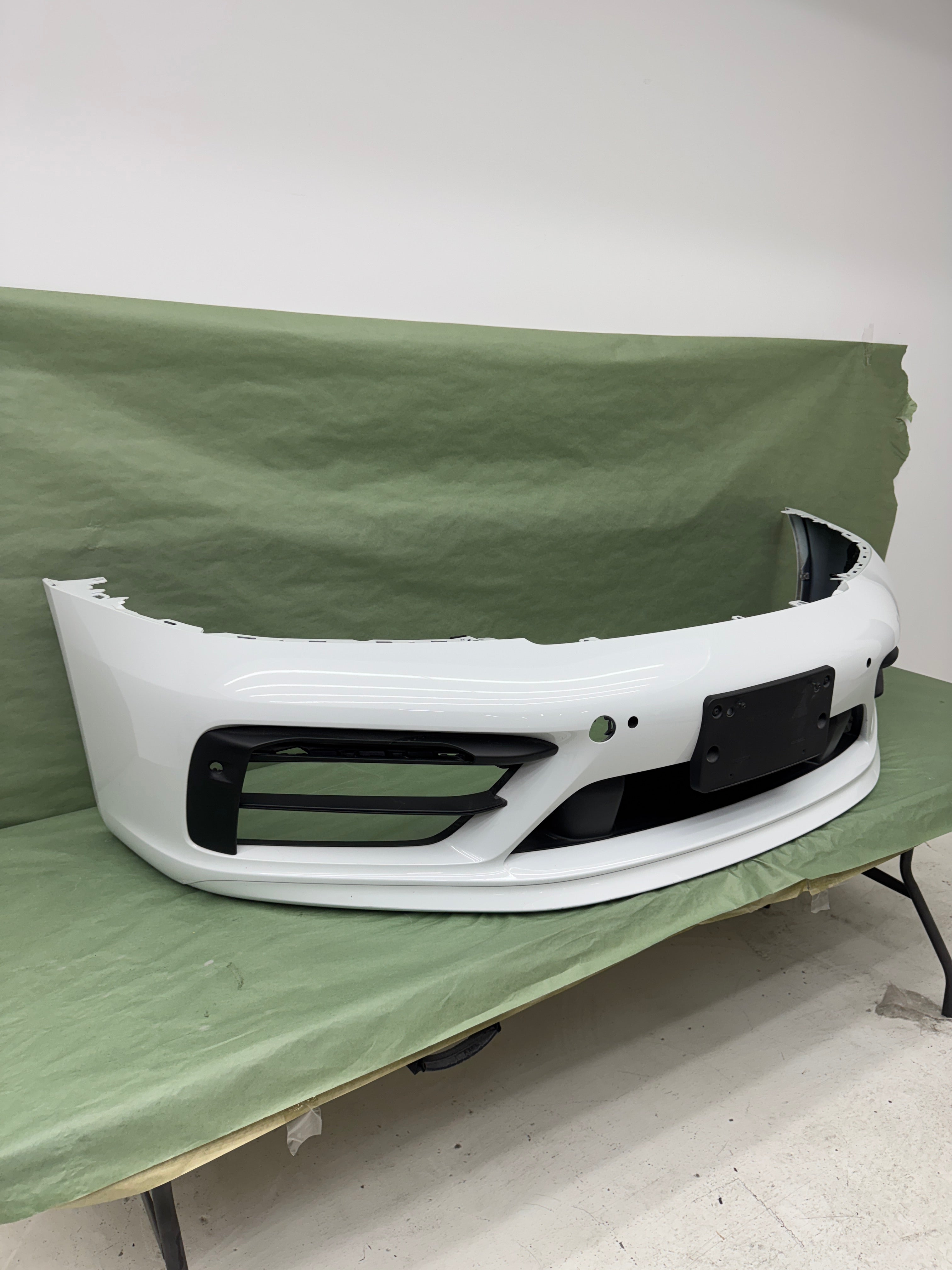 Porsche OEM Factory 992 GTS front bumper with spoiler and grills, in white