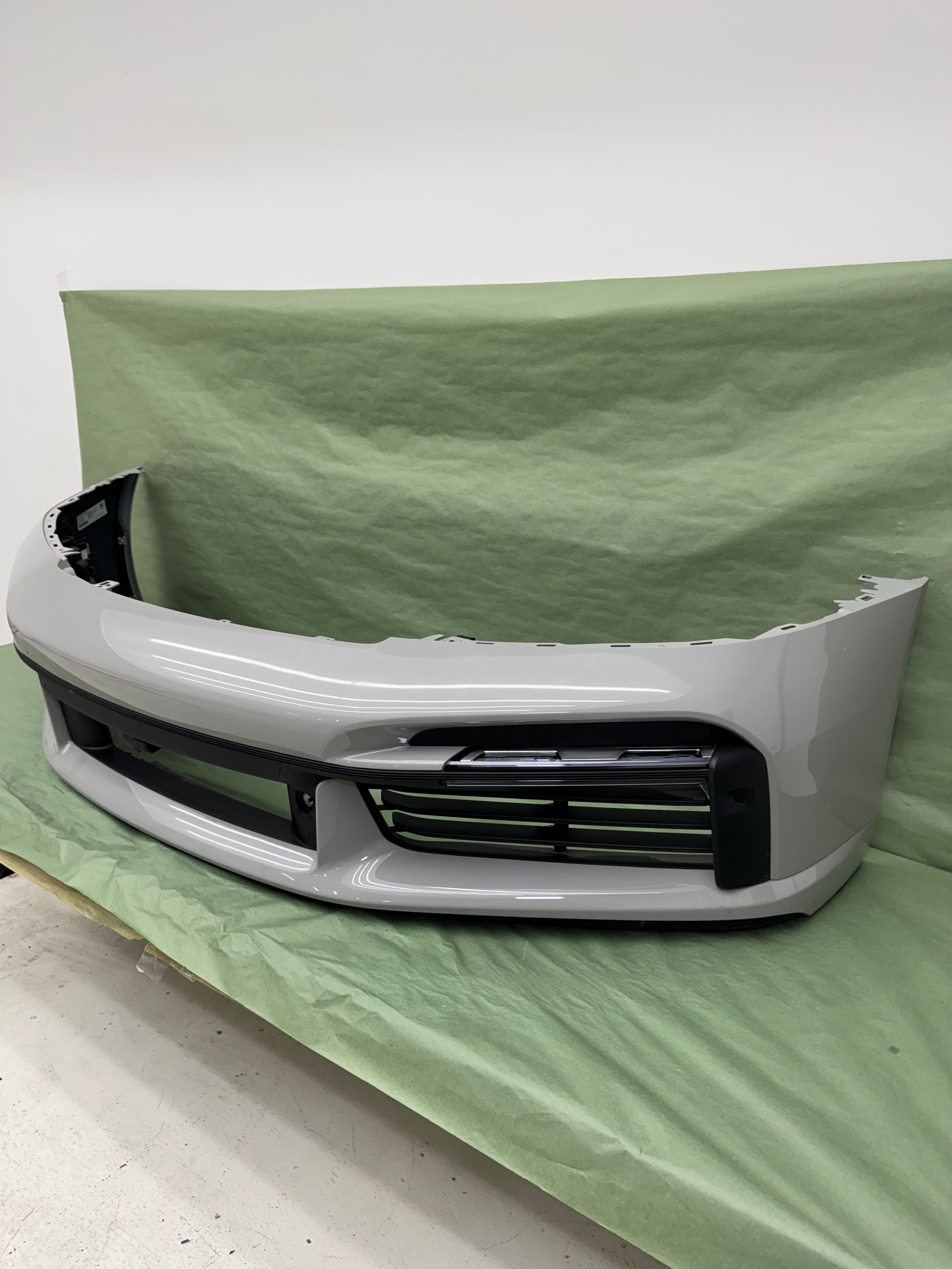 Porsche OEM Factory Turbo S front bumper, with limited attachments in chalk